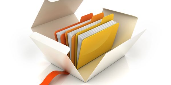 An open white box containing colorful file folders organized inside.