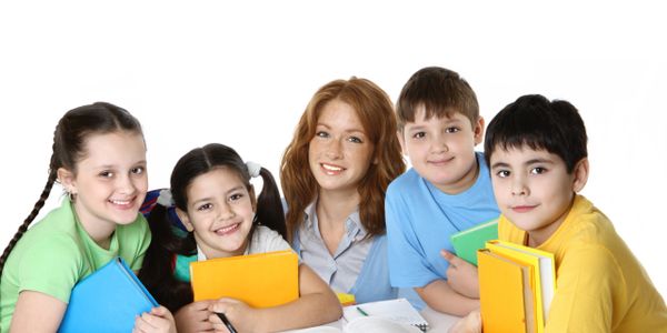 Excited young woman celebrating success in a classroom.