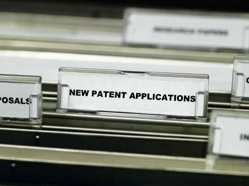 Close-up of the label for a suspension file for new patent applications in a filing cabinet