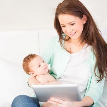 mother reading the calm parenting blog to reduce feeling overwhelmed
