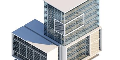 Modern glass and steel office building with sharp angles.