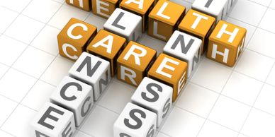 3D crossword cubes forming health, fitness, care, and success words.