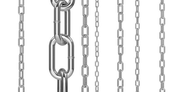 Various steel chains of different sizes hanging vertically on a white background.