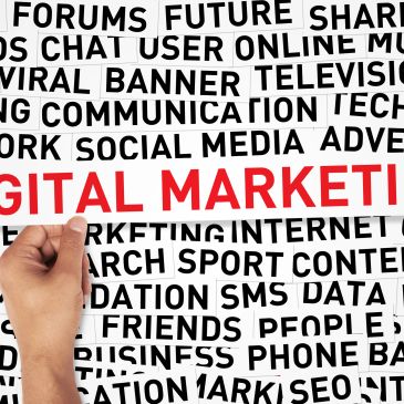 Person interacting with digital transformation icons on a screen.