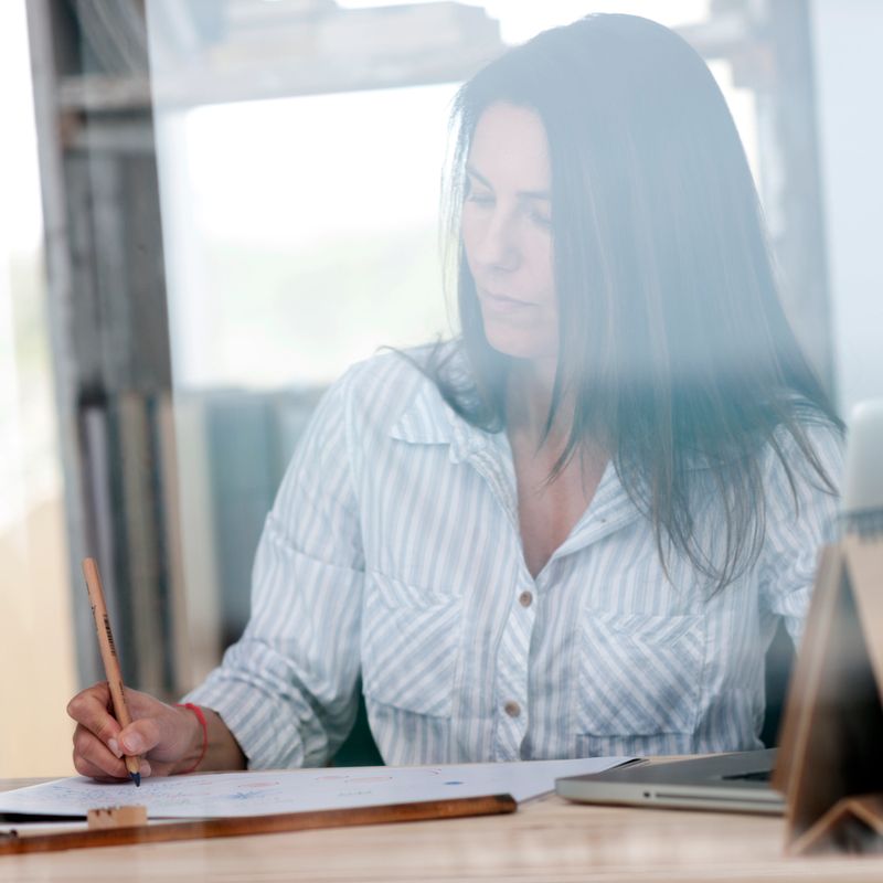 Woman working in her home office
