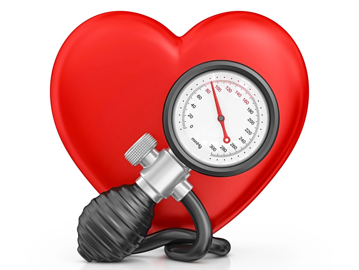 Blood pressure cuff with red heart illustration.