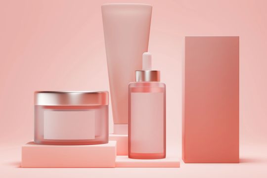 Four colorful body control spray bottles.