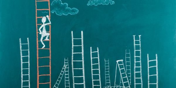 Chalk figure climbing a tall red ladder among many white ladders on a teal background.