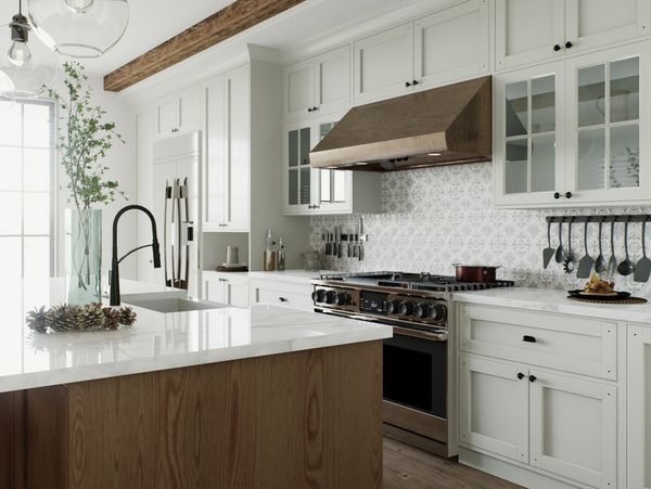 Modern kitchen with white cabinetry and wooden accents.