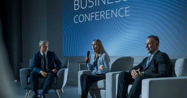 A panel discussion with multiple wireless microphones by MetroWestEvents.com