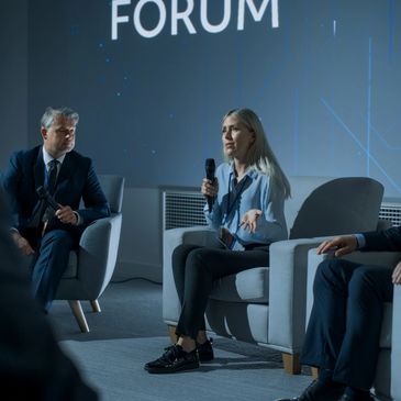 Panel discussion at a forum event.