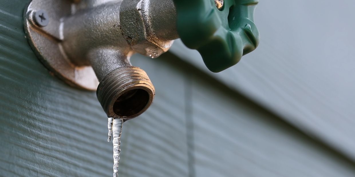 Frozen water from an outdoor spigot