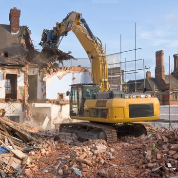demolition of abandoned house in Calgary 
