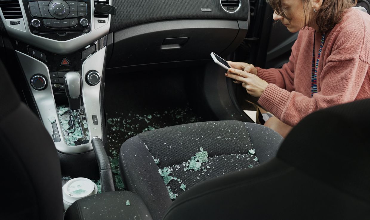 Removing broken glass debris from vehicle interior in Harvey IL