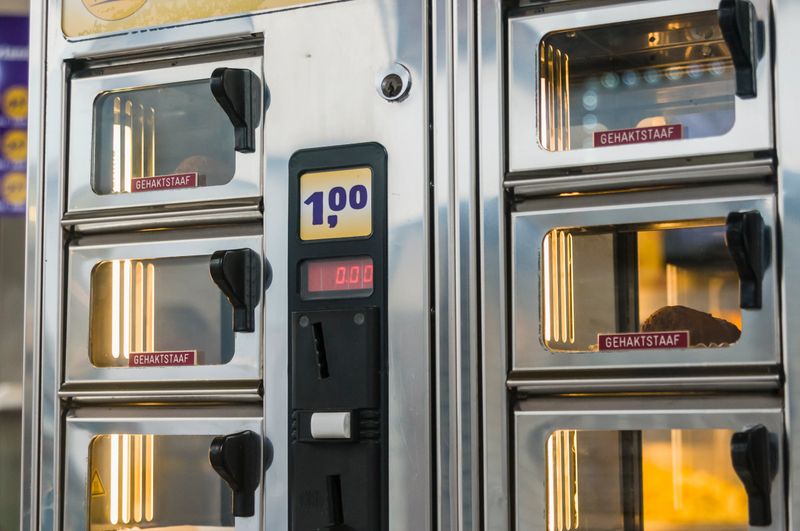 Gehaktstaaf, a traditional blend of minced beef, chicken, pork and horse,  in a vending machines for hot snacks outside a snack shop, Utrecht