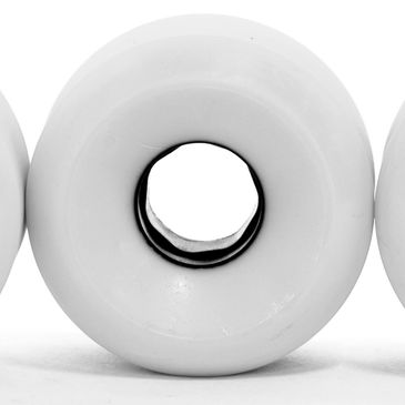 Four green skateboard wheels in a row.
