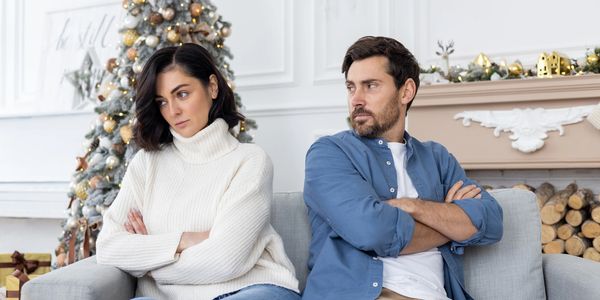 A couple sitting right next to each other