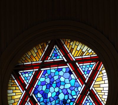 Stained glass window with Star of David