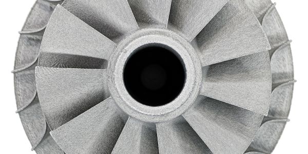 Close-up of a metal turbine fan.