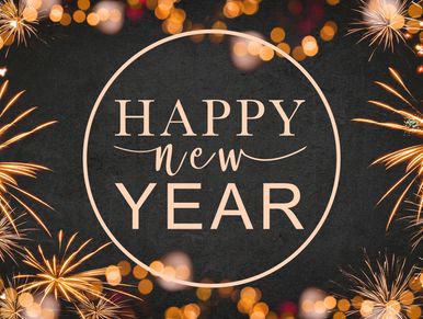 Happy New Year greeting with fireworks and bokeh lights on a dark background.