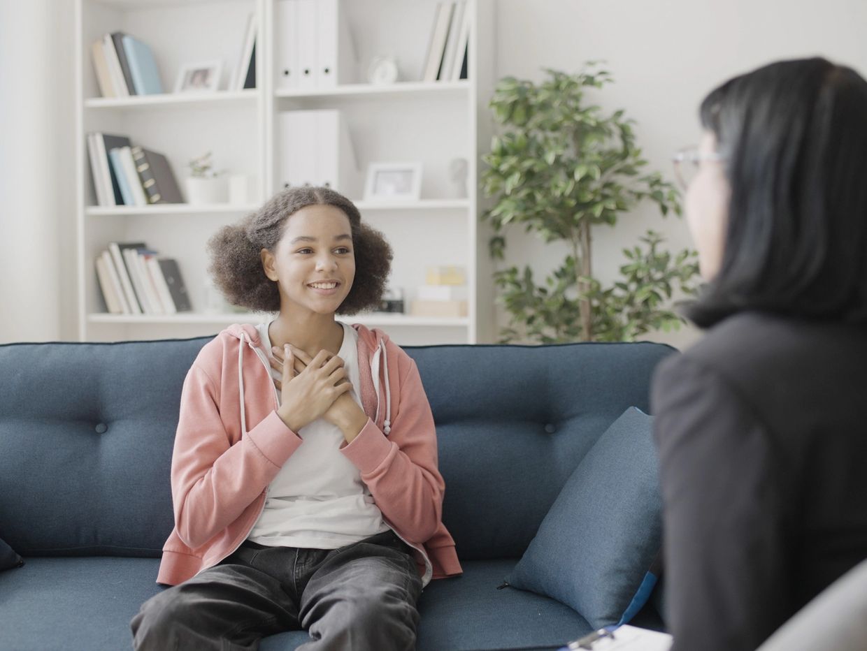 Young person feeling heard in therapy counselling 