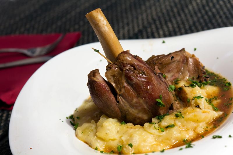 Braised lamb shank in mint and rosemary gravy, with Puree.