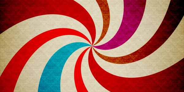 Colorful spiral swirl pattern with vintage texture.