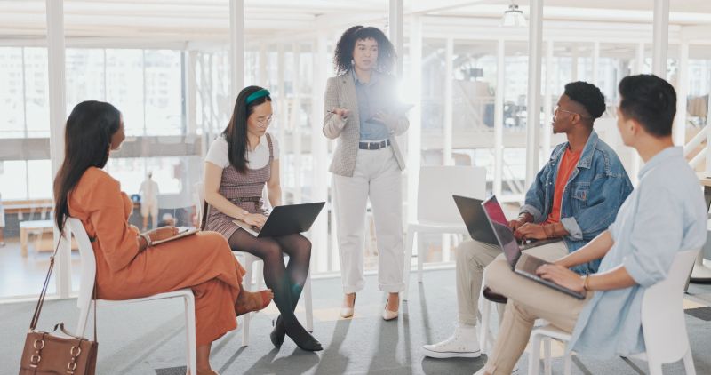 Leader, startup or speaker problem solving in meeting for planning or digital strategy in office.