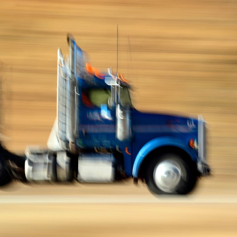 Walsenburg, Colorado USA- November, 2023  A Semi Truck rolls along the highway. 11.46 Billion Tons of Freight were transported by trucks in 2022 in the USA.