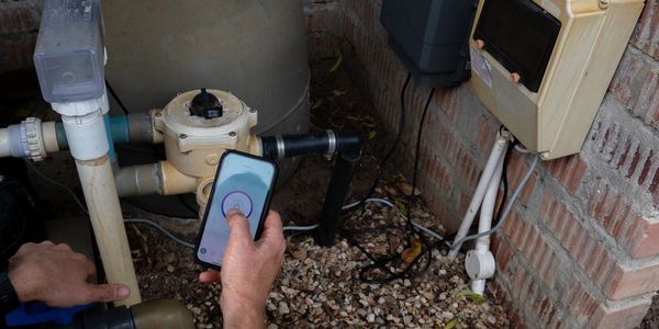 Ongoing equipment check during pool service in Pasco County.