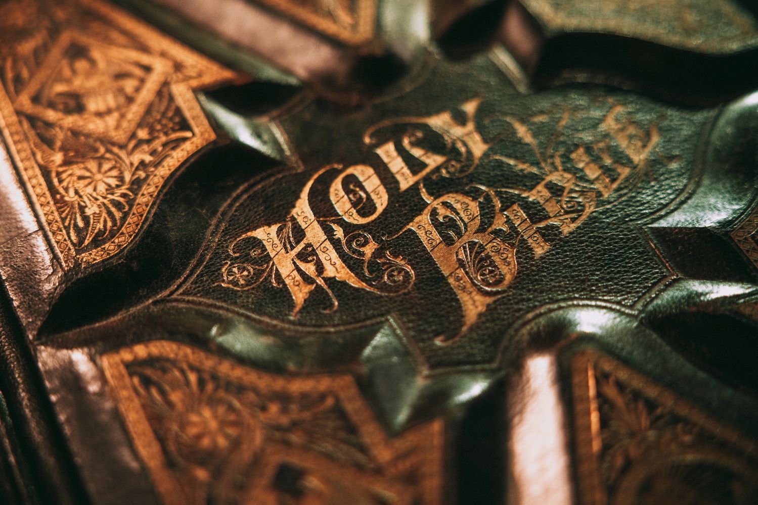Close up of the cover of an old antiquarian leather bible.