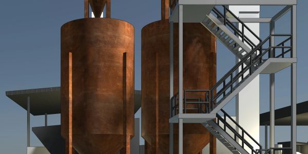 Industrial facility with large rust-colored silos and metal staircases.
