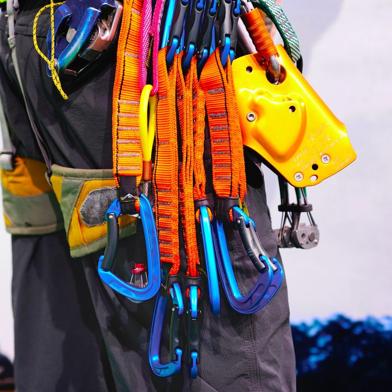 A young people is ready to rock climbing. 