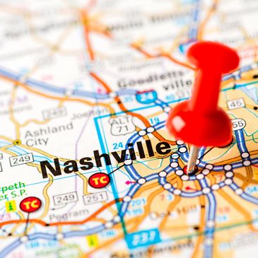 Red pushpin marking Nashville on a detailed map.