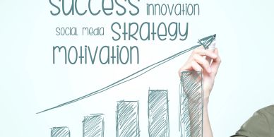 Hand drawing increasing business graph with motivational words.