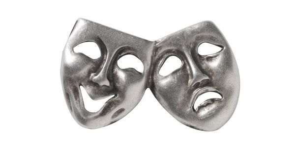 Metal comedy and tragedy theater masks symbolizing drama.