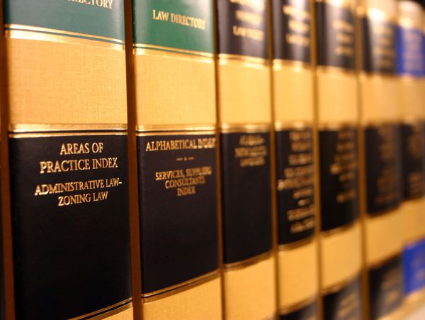 Law books in a Hartford CT law office, showcasing in-depth legal research for evictions, probate.