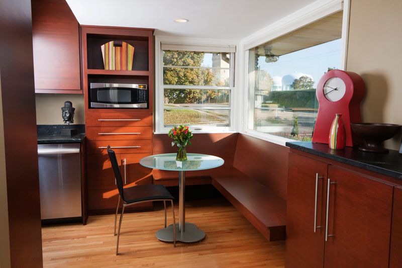 Subject: contemporary kitchen design. The breakfast area coffee table with seating.