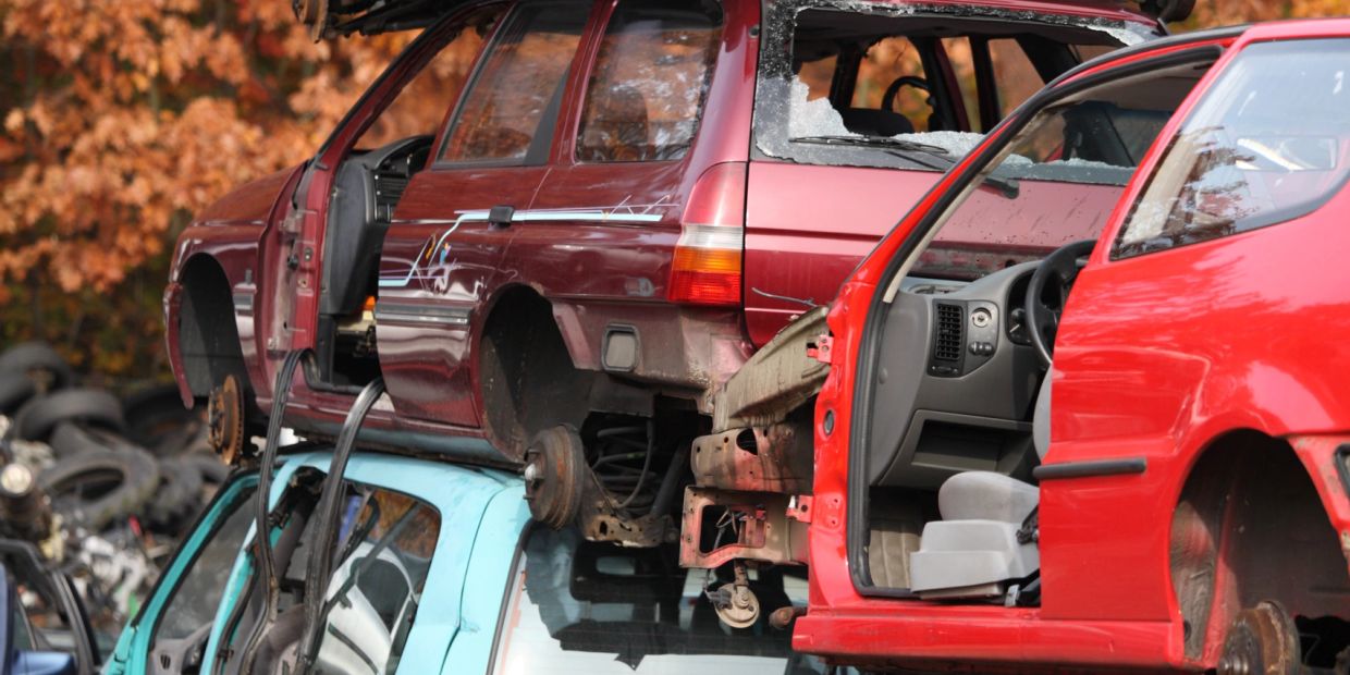 Close-up of a vintage car dashboard with wooden accents and classic gauges.