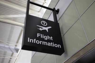 Airport sign for flight information.