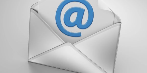 An open envelope with a paper showing a blue email @ symbol.