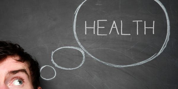 Person exploring health options with visual aids.