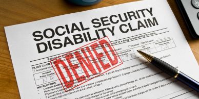 Social security disability claim form stamped denied.