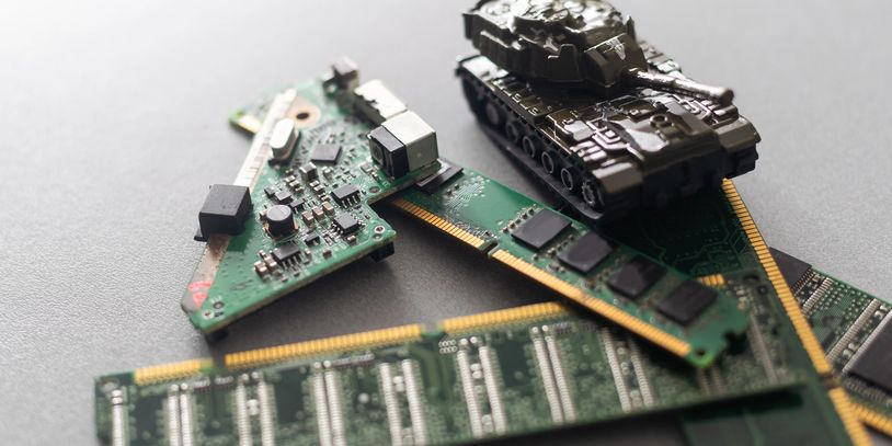 Military tank on the move representing AS9100-compliant PCB assembly for aerospace and defense EMS.