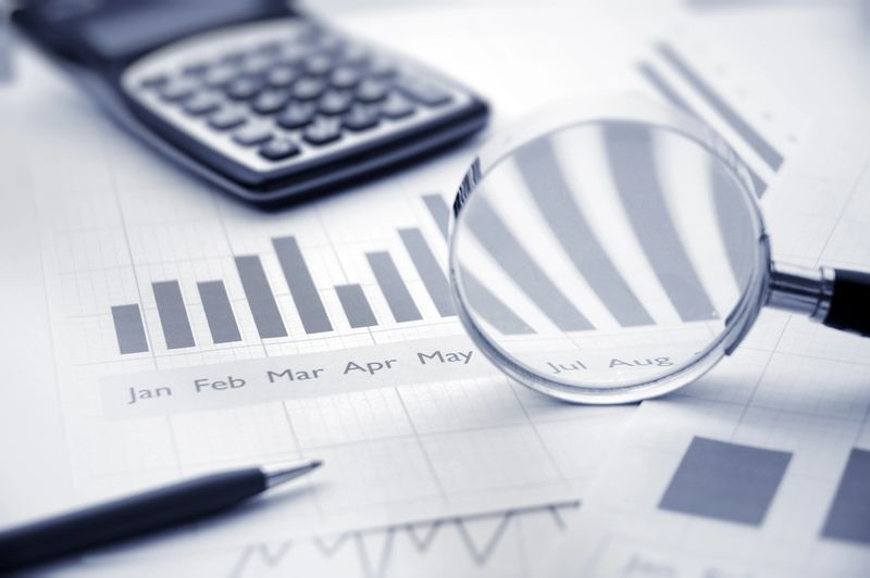 "calculator, pen and magnifing glassFinance and Business:"