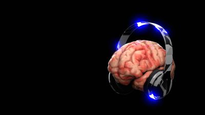 Brain with headphones glowing blue on black background.