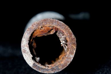 Close-up of a heavily rusted pipe that was serviced in Roseville, California for their sewer line back up.