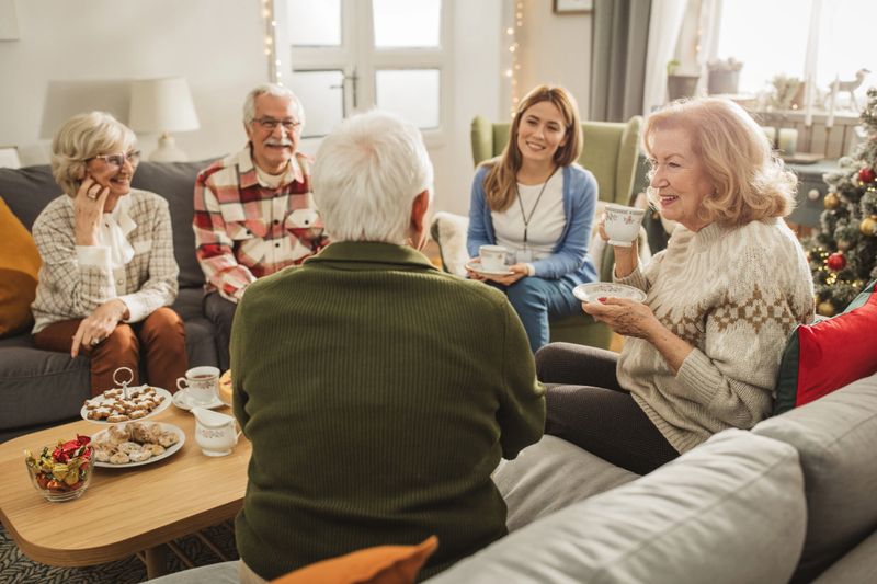 Senior people celebrating Christmas at nursing home.