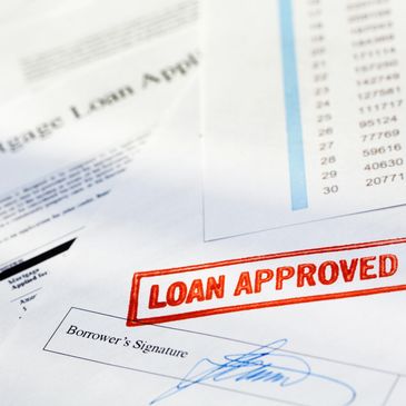 Signed mortgage documents with loan approved stamp – notary loan signing agent NC