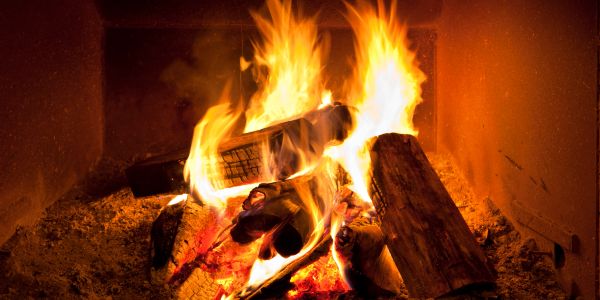 A warm fire burning with logs.